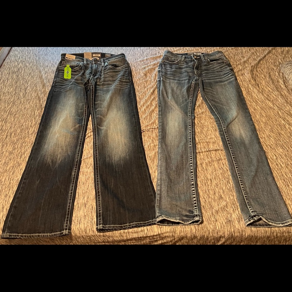 2 brand new pairs of buckle jeans, size 28r and 28s